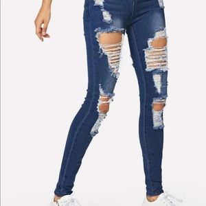 Dark washed rip jeans